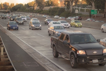 Car driving down a freeway