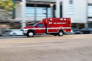 Ambulance driving down road