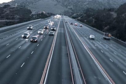 Car driving down a freeway